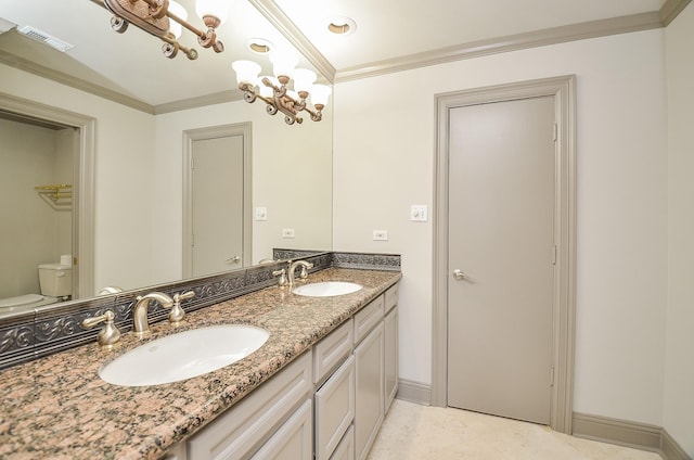 bathroom with crown molding, tile patterned flooring, vanity, and toilet