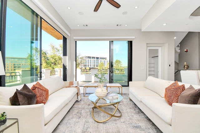 living room featuring ceiling fan