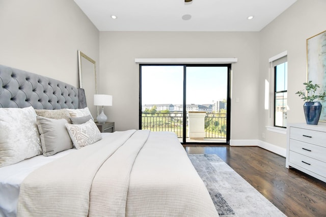 bedroom featuring dark wood-type flooring and access to outside