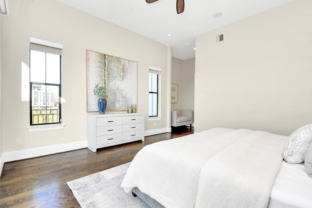 bedroom featuring dark hardwood / wood-style floors and ceiling fan