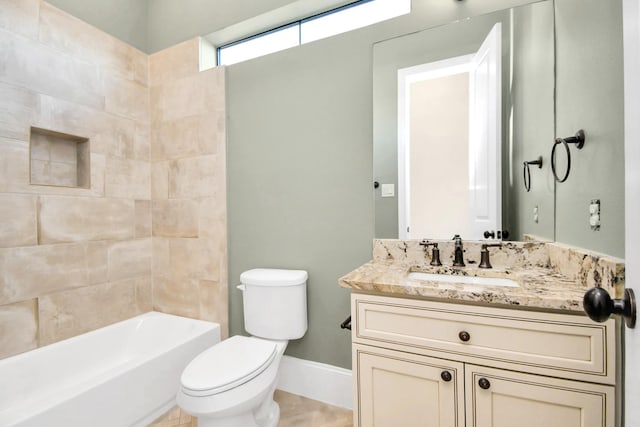 full bathroom featuring vanity, toilet, and tiled shower / bath combo