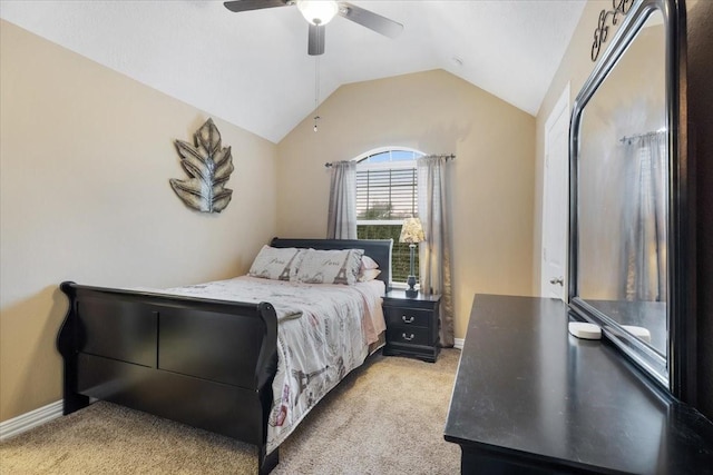 carpeted bedroom featuring ceiling fan and lofted ceiling