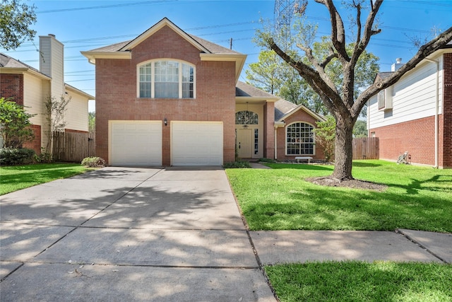 front facade with a garage and a front yard