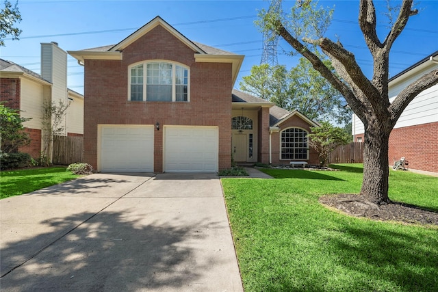 view of front facade featuring a front lawn and a garage