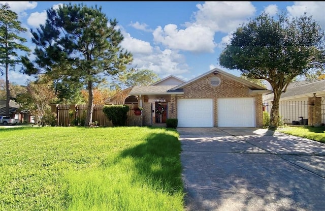 ranch-style home with a front yard and a garage