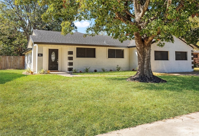 view of front of house with a front lawn