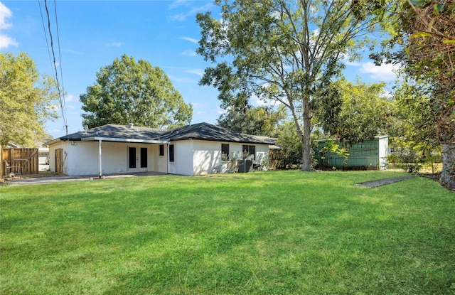 view of yard with french doors