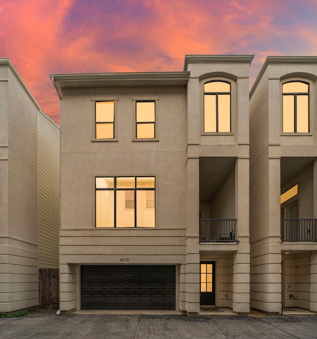 view of front of property with a garage