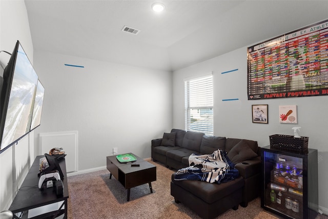 living room with carpet flooring and lofted ceiling