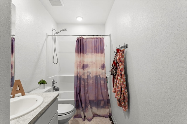 bathroom with visible vents, toilet, a textured wall, shower / bath combination with curtain, and vanity