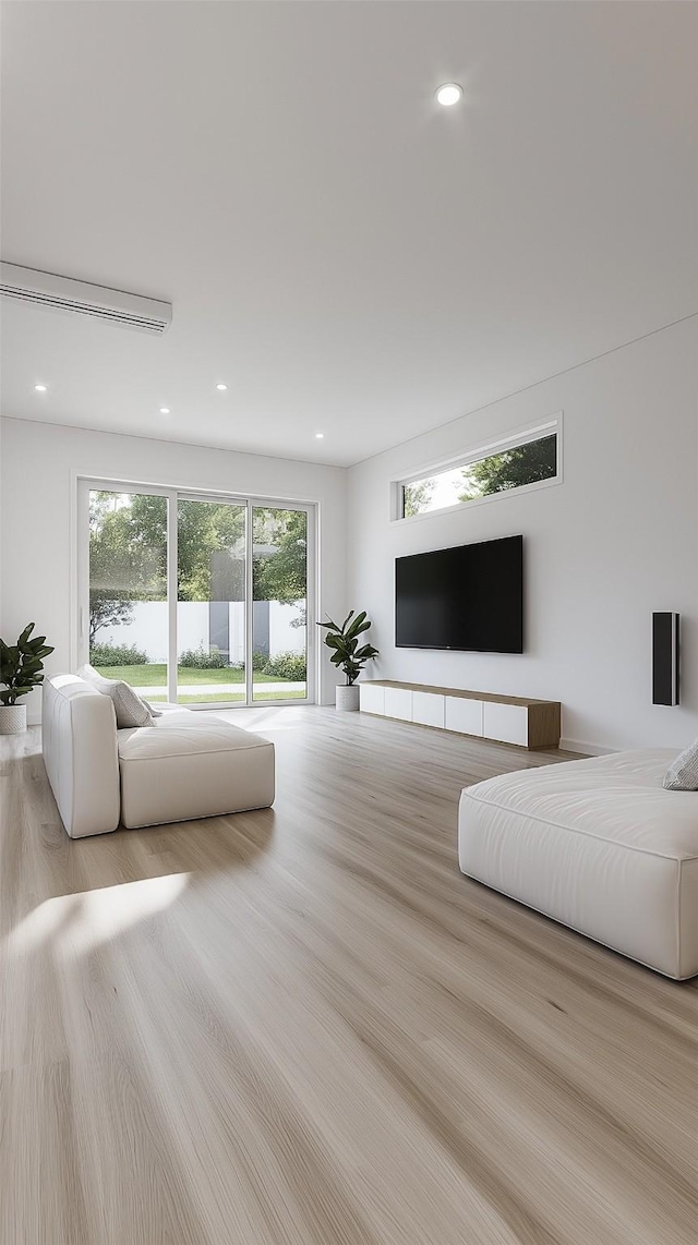 unfurnished living room featuring light hardwood / wood-style flooring