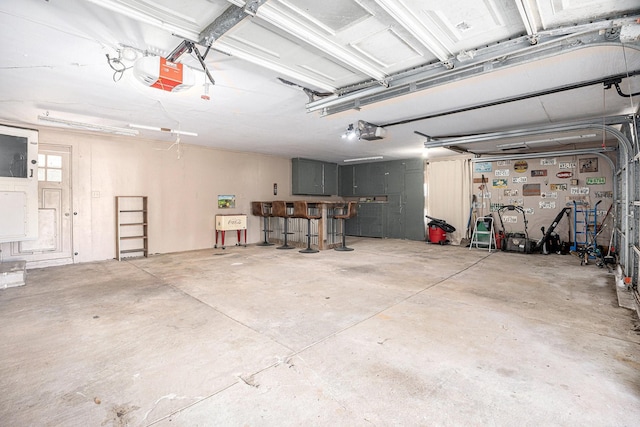 garage featuring a garage door opener