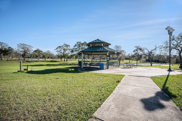 view of home's community with a gazebo and a lawn