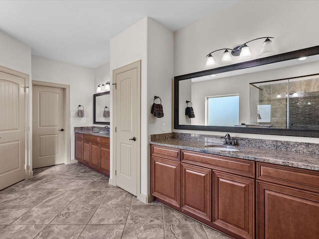 bathroom featuring vanity and a shower