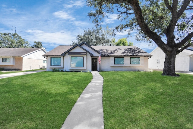 ranch-style home with a front yard