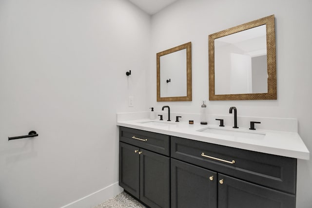 bathroom with tile patterned floors and vanity