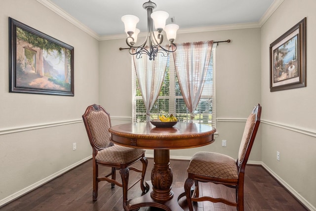 dining room featuring dark hardwood / wood-style floors, an inviting chandelier, and ornamental molding