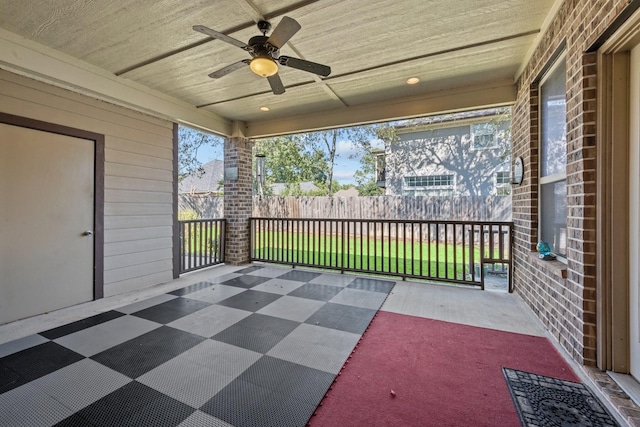 view of patio featuring ceiling fan