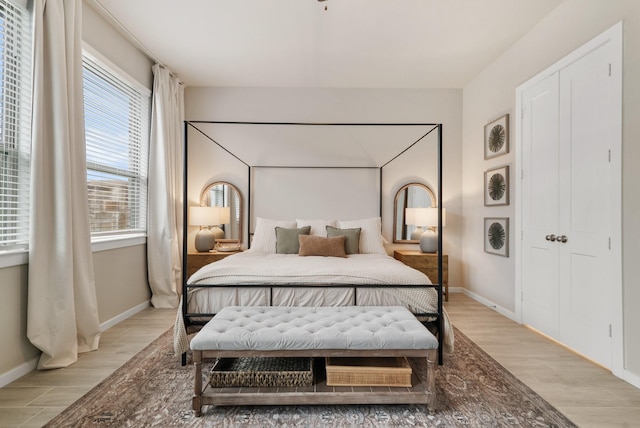 bedroom with light hardwood / wood-style floors