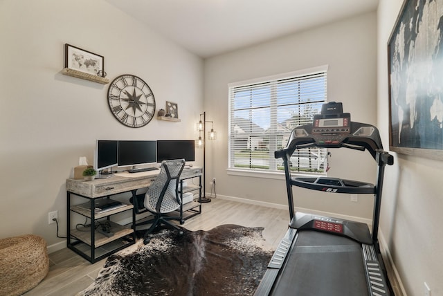 office space with light hardwood / wood-style floors