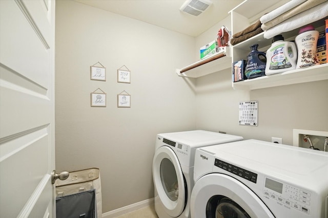 laundry area featuring independent washer and dryer