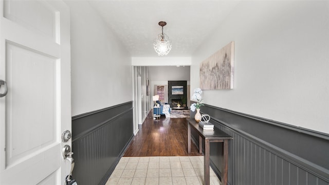 hallway featuring tile patterned flooring