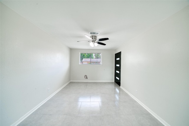 unfurnished room with ceiling fan