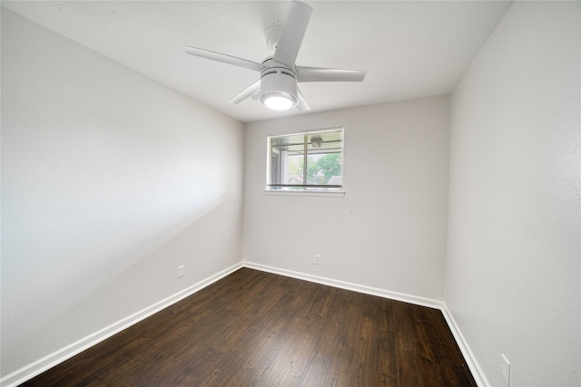 unfurnished room featuring dark hardwood / wood-style floors and ceiling fan