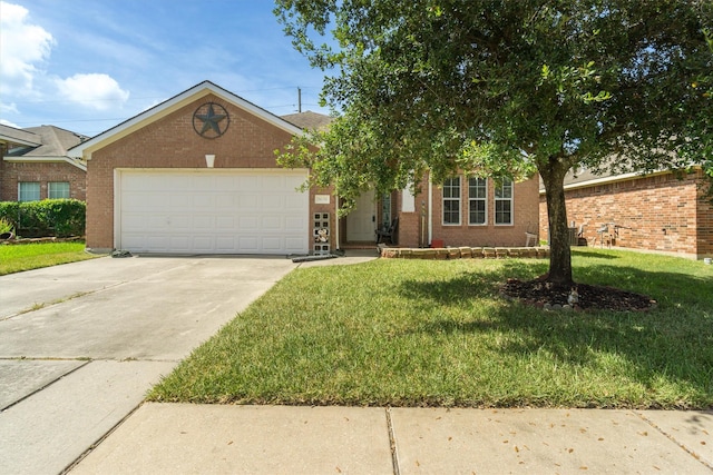 view of front of house with a front yard and a garage