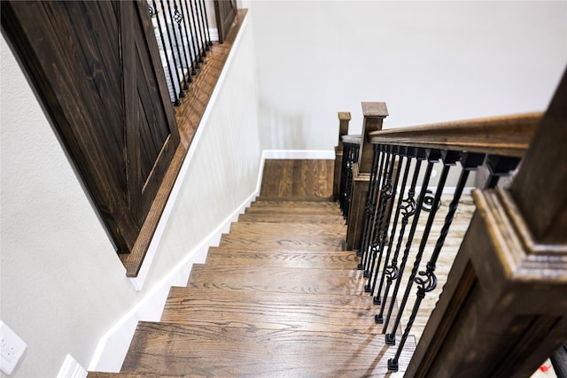 13112 County Road 65, Rosharon, TX 77583 - stairs featuring baseboards and wood finished floors