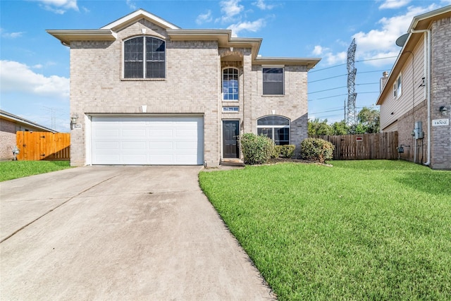 view of front of house with a front lawn and a garage