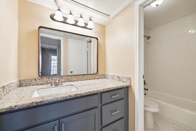 full bathroom featuring vanity, ornamental molding, bathtub / shower combination, and toilet