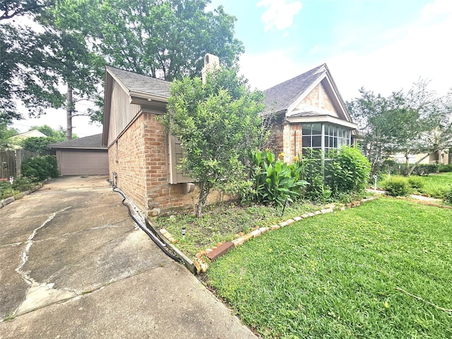 view of home's exterior with a lawn