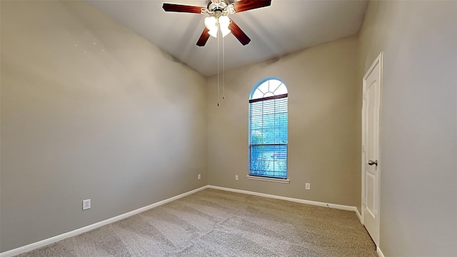 empty room with carpet and ceiling fan