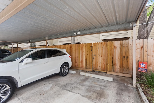 garage featuring a carport