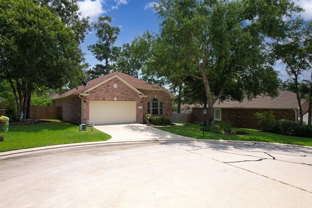 ranch-style house with a front lawn and a garage