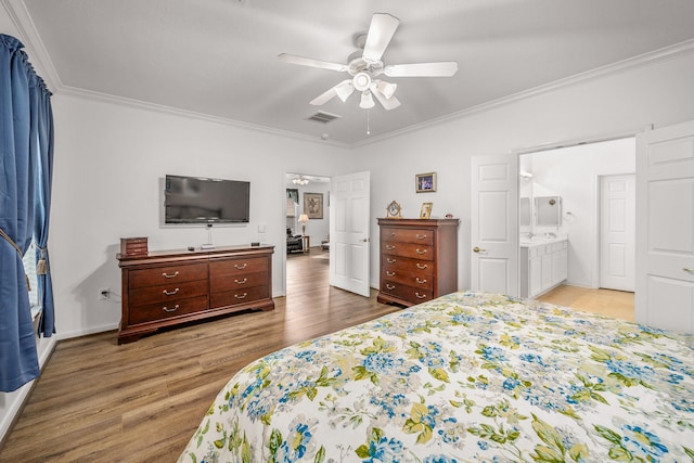 bedroom featuring connected bathroom, ceiling fan, crown molding, and hardwood / wood-style flooring