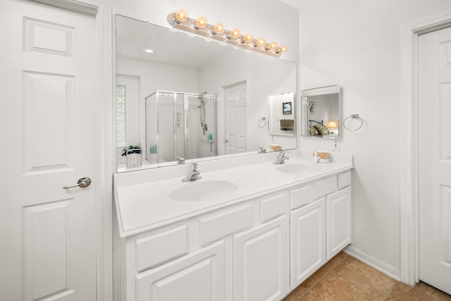 bathroom featuring vanity and walk in shower