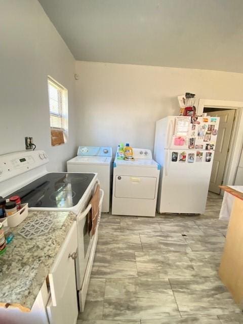 laundry area with washer and dryer