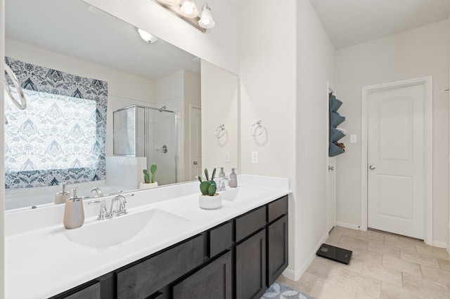 bathroom with a shower with door and vanity