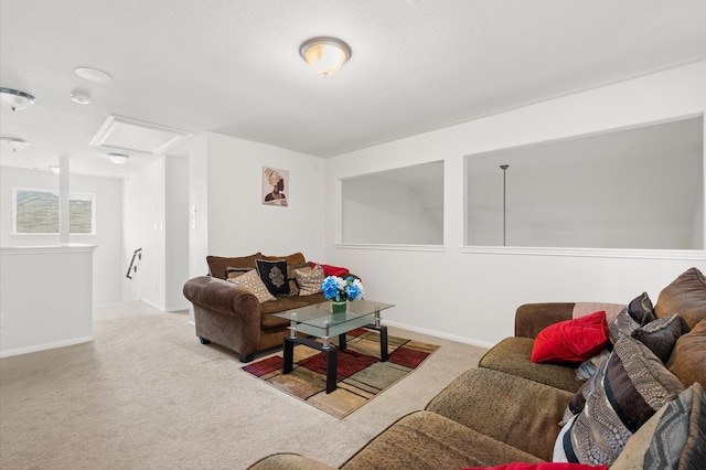 living room featuring light carpet