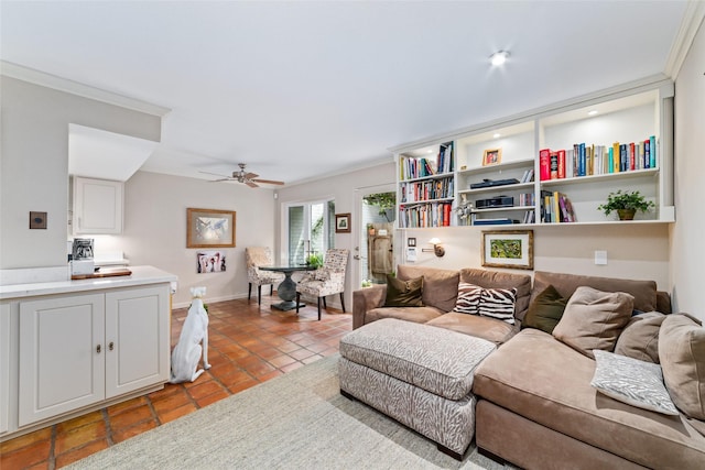 tiled living room with ceiling fan and crown molding