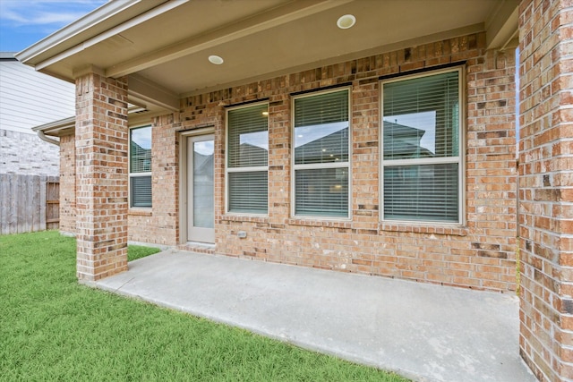 doorway to property featuring a patio