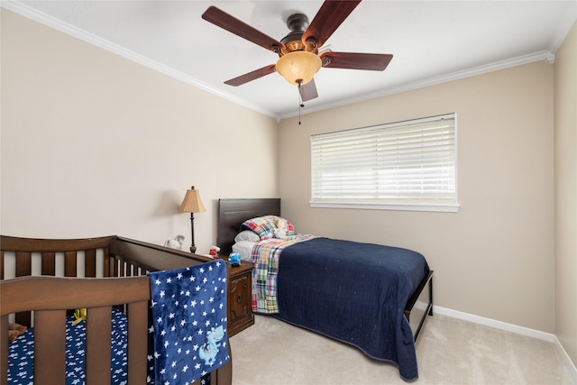 bedroom with light carpet, ceiling fan, and crown molding