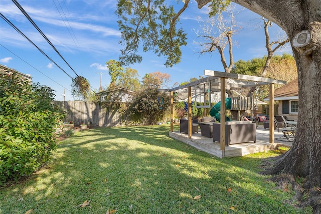 view of yard with an outdoor living space and a patio