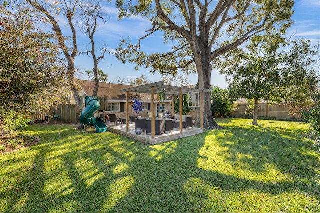 view of yard with outdoor lounge area, a pergola, a playground, and a patio area