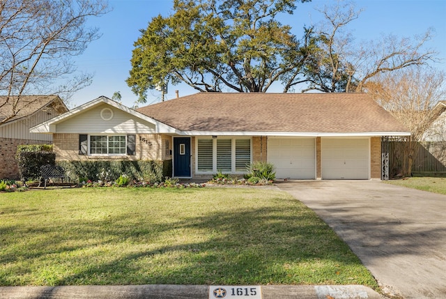 ranch-style home featuring a garage and a front yard