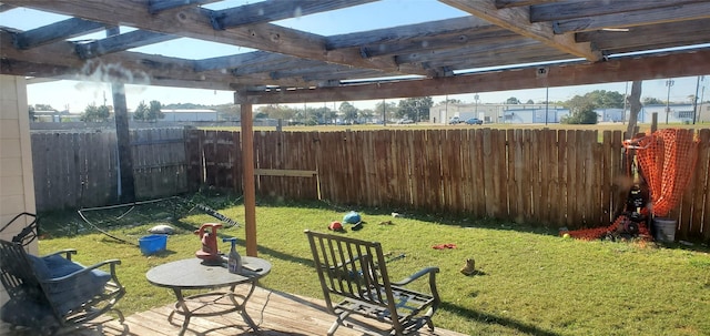 view of yard featuring a deck and a pergola