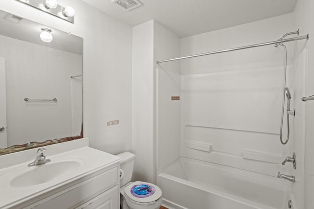 full bathroom with vanity, shower / bathtub combination, and toilet