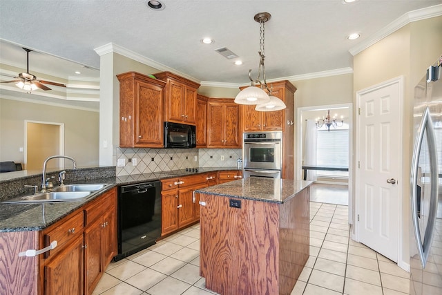 kitchen featuring sink, dark stone counters, black appliances, ceiling fan with notable chandelier, and ornamental molding